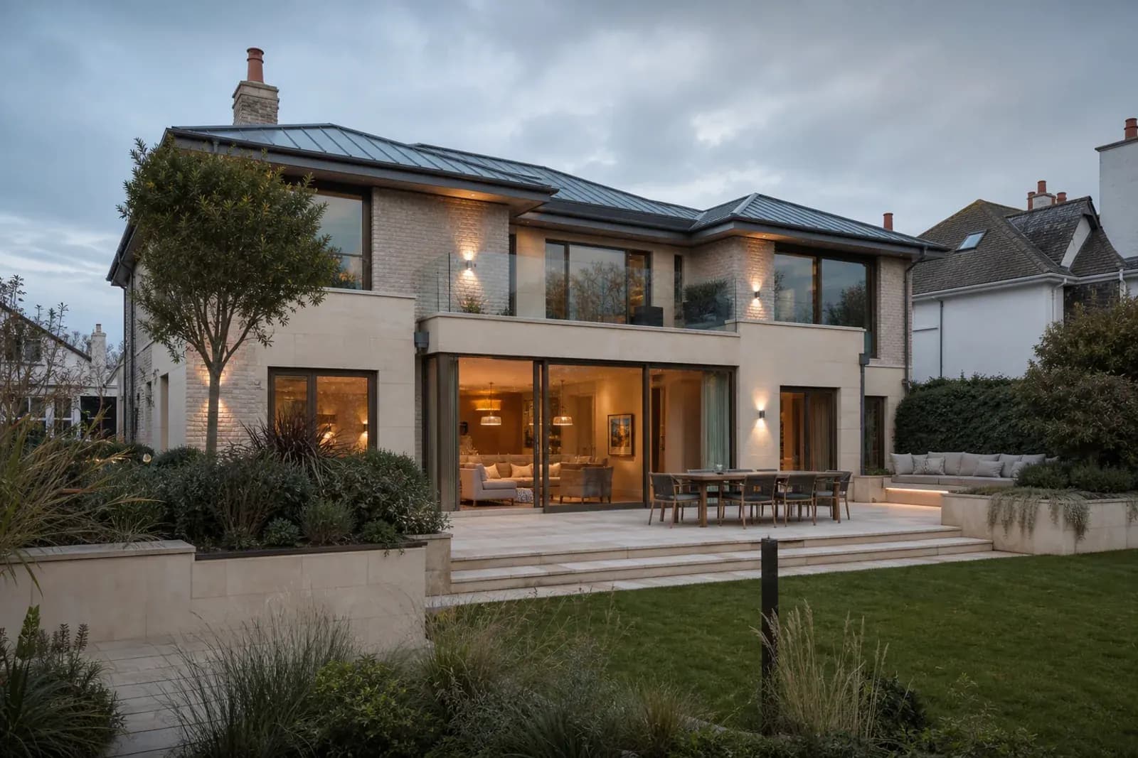 Contemporary coastal residence with broad glazing and resilient dune planting