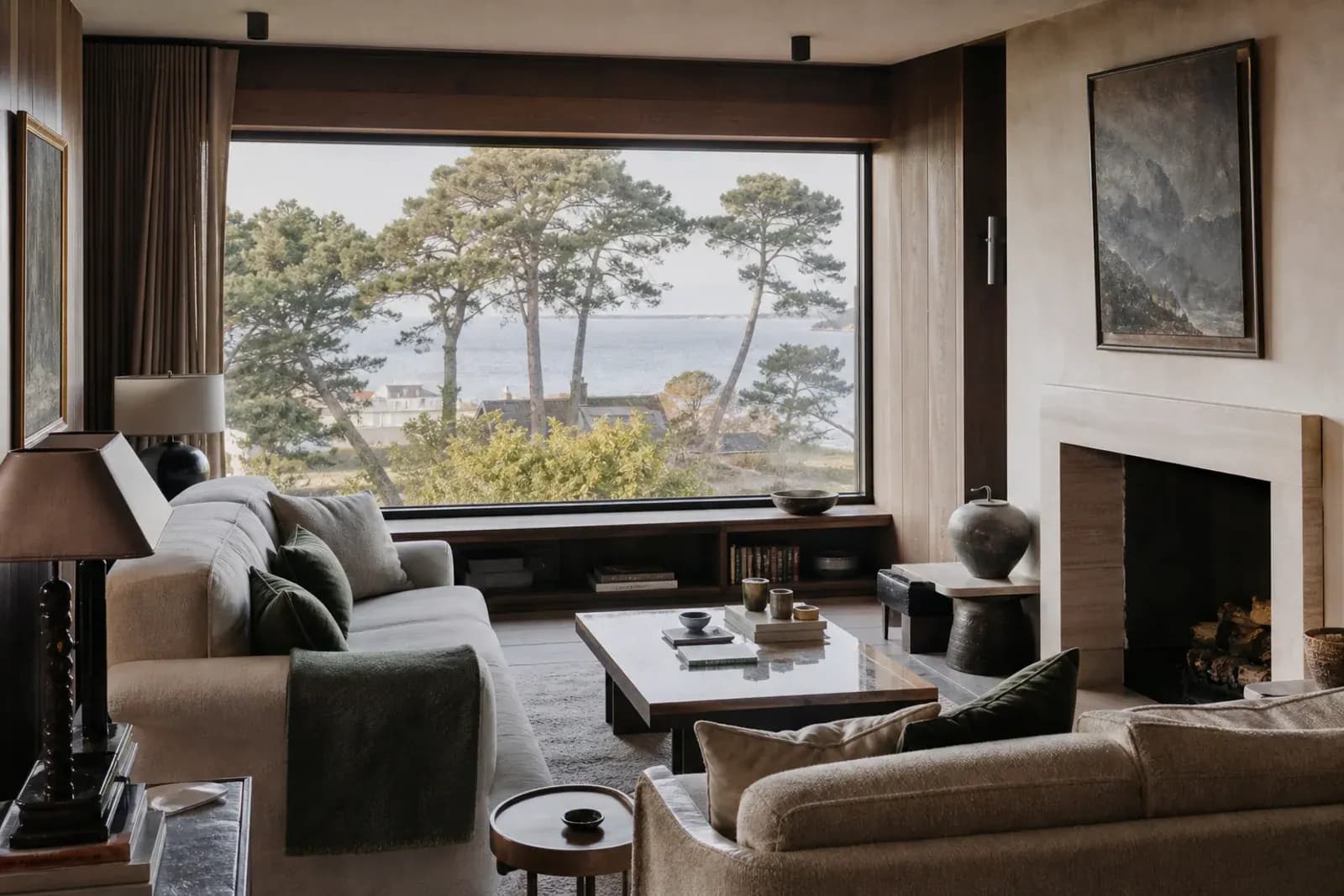 Smoked-oak lounge with a broad window overlooking Poole Harbour