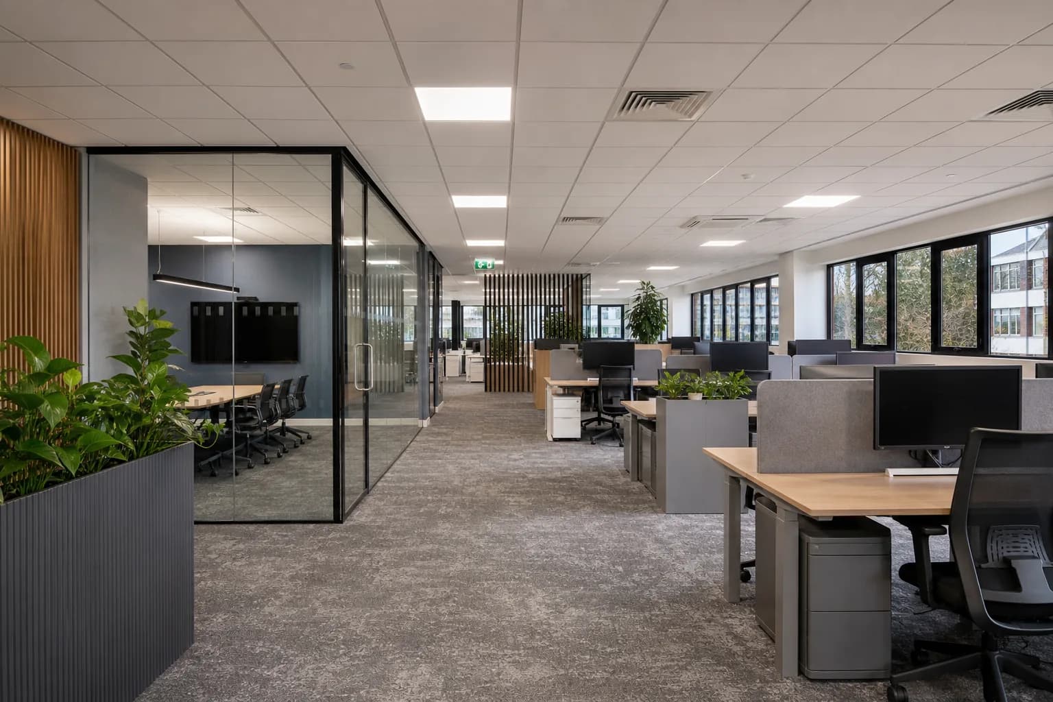 Completed modern office refurbishment with coordinated workspaces and services Completed modern office refurbishment with coordinated workspaces and services