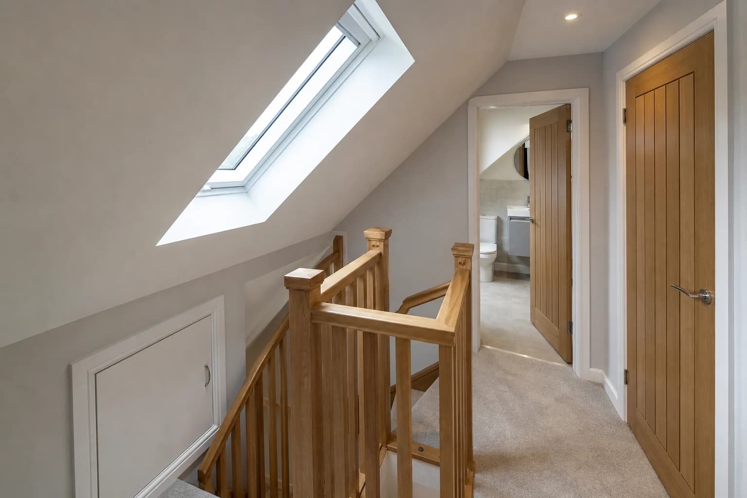 Completed loft stair and landing planned around useful roof-space accommodation Completed loft stair and landing planned around useful roof-space accommodation