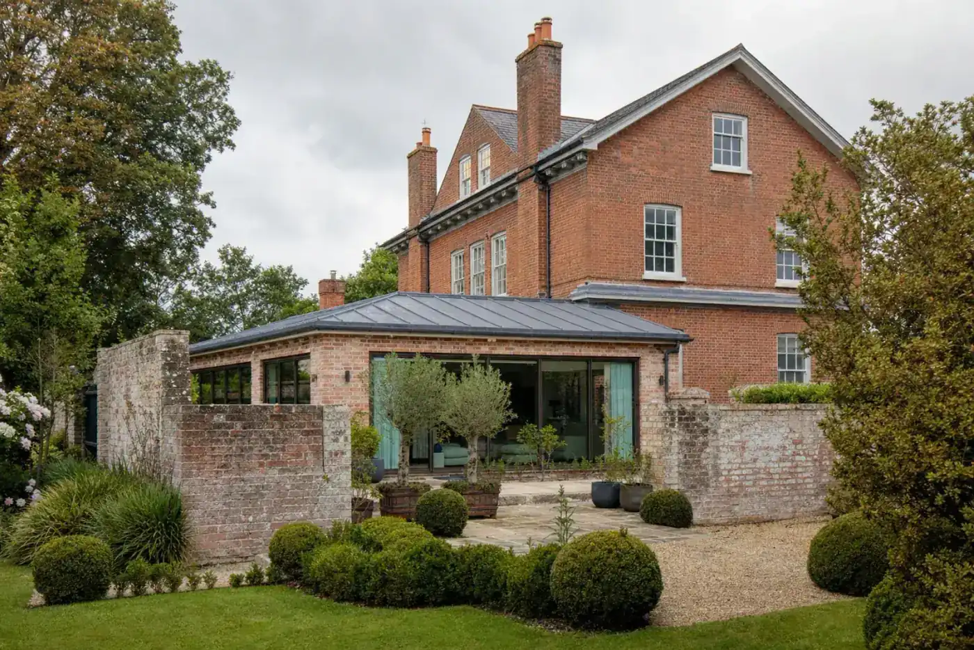 Red-brick period home with a sensitive reclaimed-brick garden extension